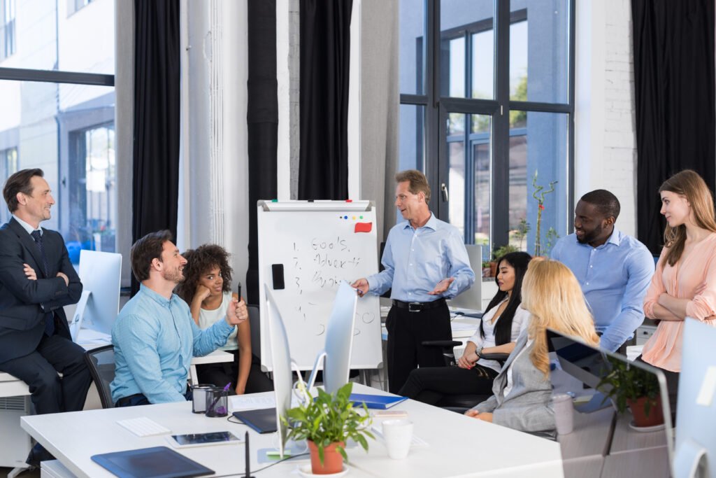 Executive team planning sales strategy.